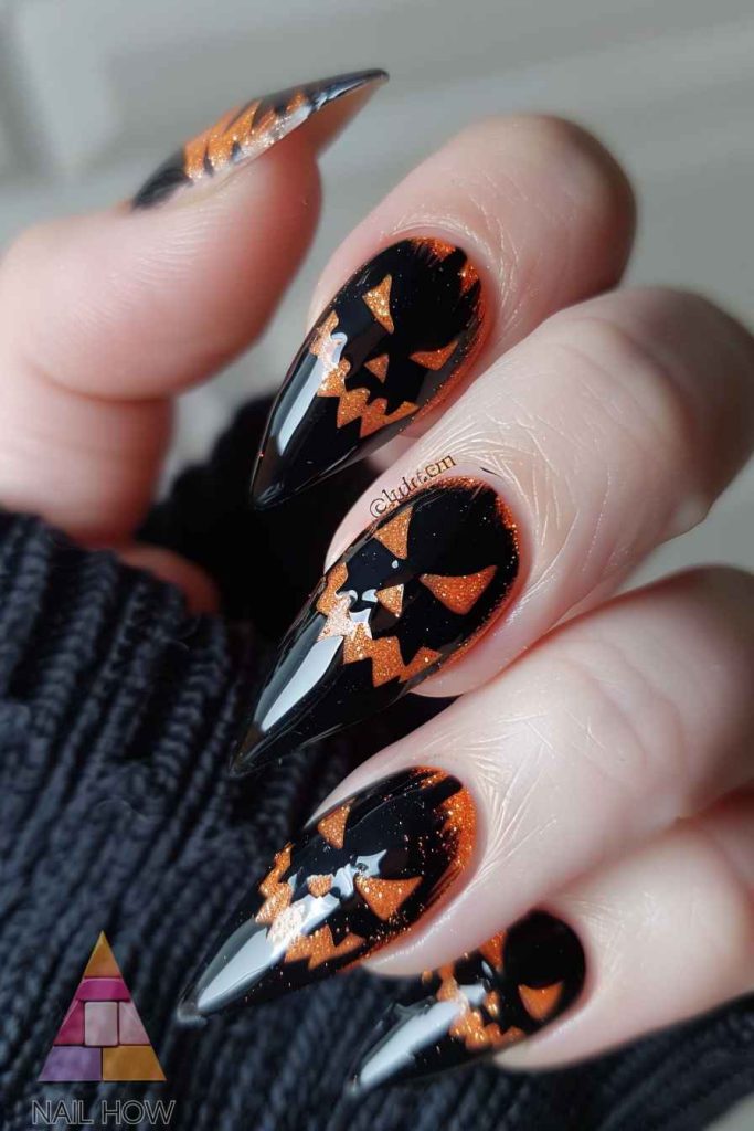 Halloween Nail Art Extravaganza: From Spooky to Sophisticated 32 halloween nails 31 https://nailhow.com/halloween-nail-art/